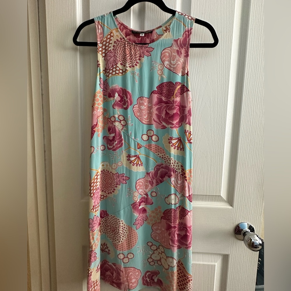 Cinnamon girl size small.  Seafoam green floral dress.
